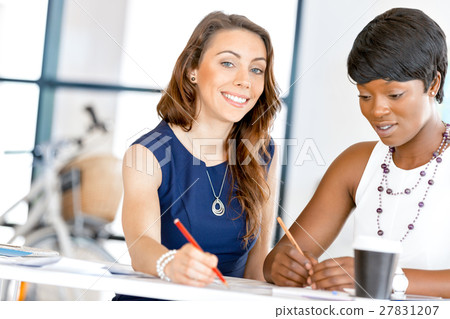 Women working together, office interior Women working together, office interior 27831207