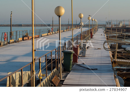 Pier in a Sunny Winter Day Pier in a Sunny Winter Day 27834907