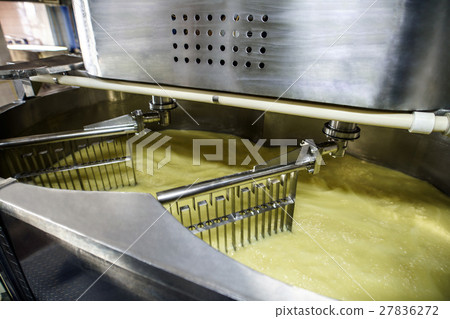 Equipment at dairy processing plant at work Equipment at dairy processing plant at work 27836272