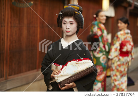 Geiko walking in Chaya Street 27837704