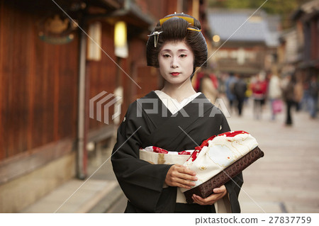 Geiko walking in Chaya Street 27837759
