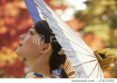 Brilliant autumn leaves and kimono female portrait 27837958