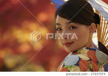 Brilliant autumn leaves and kimono female portrait 27837974