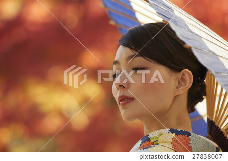 Brilliant autumn leaves and kimono female portrait 27838007