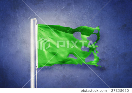 Torn green flag flying against grunge background Torn green flag flying against grunge background 27838620