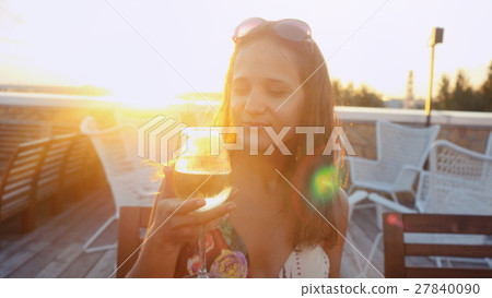 Portrait of beautiful young woman drinking wine Portrait of beautiful young woman drinking wine 27840090
