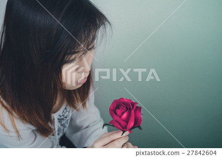 Portrait of Asian Women and Pink Rose. 27842604