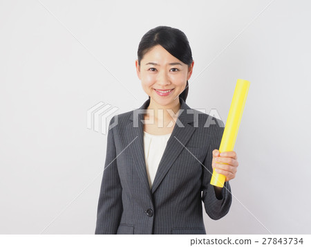 Business woman with baton Business woman with baton 27843734