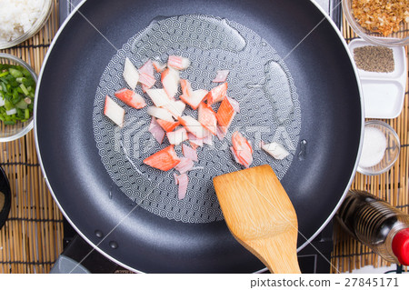 Chef stir fried crab imitation in pan Chef stir fried crab imitation in pan 27845171