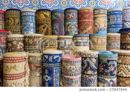 Carpets and kilims rolled up 27847844