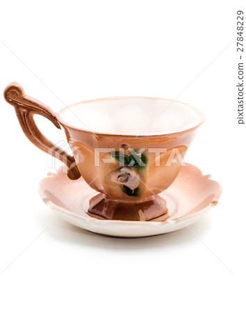 Empty coffee cup on a saucer isolated on white. 27848229