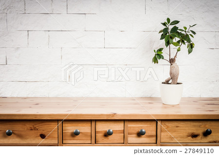 wooden shelf, flower and wall 27849110