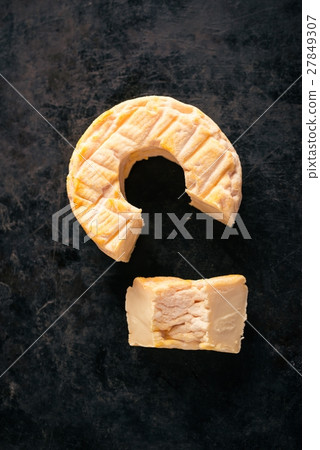 Top view on portion cut from whole camembert Top view on portion cut from whole camembert 27849307