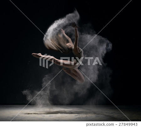 Girl in body jumps in dust cloud black background Girl in body jumps in dust cloud black background 27849943
