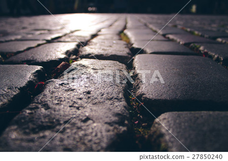 Background of cobblestones on the pavement closeup Background of cobblestones on the pavement closeup 27850240