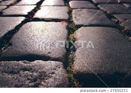 Background of cobblestones on the pavement closeup Background of cobblestones on the pavement closeup 27850251