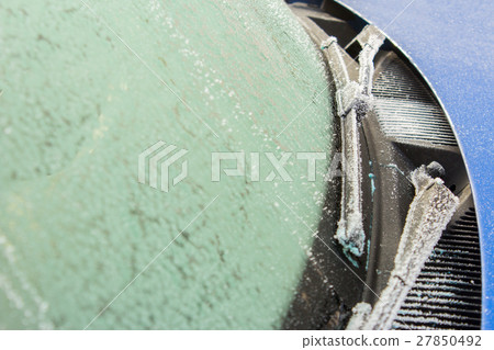 Wiper blades and car glass in frost and snow Wiper blades and car glass in frost and snow 27850492