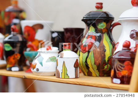 Ceramic dishes, tableware, jugs on Easter market 27854948