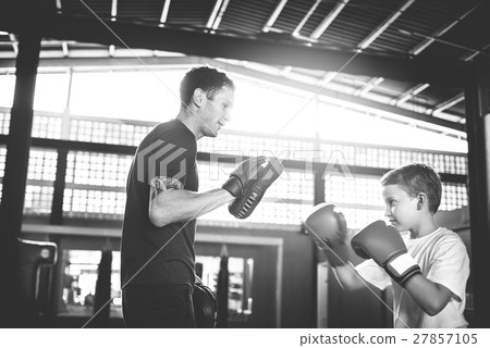 Boy Boxing Training Punch Mitts Exercise Concept 27857105