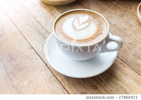 Cup of coffee latte art on wood table Cup of coffee latte art on wood table 27860421