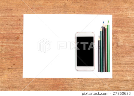 White paper with smart phone on wooden table 27860683