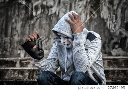 man in the hood and white mask with confused 27869495