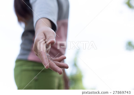 Help concept woman hand reachin pick up someone Help concept woman hand reachin pick up someone 27869743