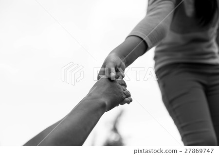 Help Concept Hands reaching out help old woman Help Concept Hands reaching out help old woman 27869747
