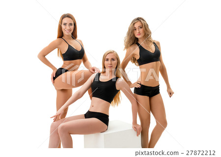 Slim girls posing in sexy slinky black sportswear 27872212