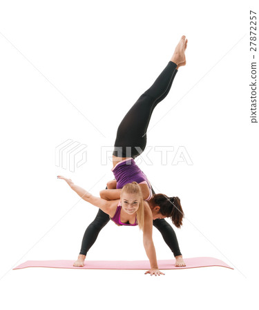 Slim sportswomen in tops and leggings in studio Slim sportswomen in tops and leggings in studio 27872257