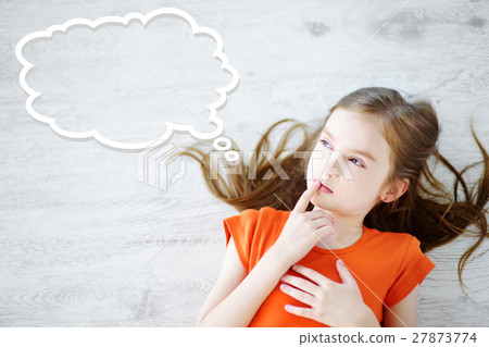 Little girl lying on floor with a speech bubble Little girl lying on floor with a speech bubble 27873774