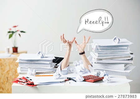 The many crumpled papers on desk of stressed male The many crumpled papers on desk of stressed male 27873983