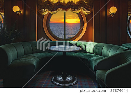 Lounge on a cruise ship with tables and armchair 27874644