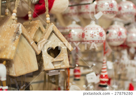 Hanging Christmas decorations in the shop Hanging Christmas decorations in the shop 27876280