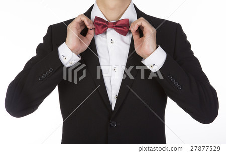 businessman adjusting red bow tie 27877529