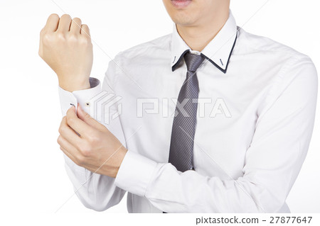 businessman adjusting sleeves businessman adjusting sleeves 27877647