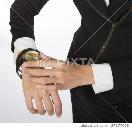 businesswoman adjusting watch businesswoman adjusting watch 27877658