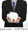 Man holding a piggy bank 27877674
