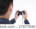 man playing with joystick 27877680