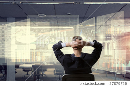 Businessman relaxing in his office mixed media Businessman relaxing in his office mixed media 27879736