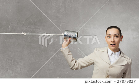 Woman using deaf phone 27879827