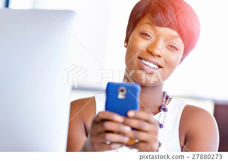 Portrait of smiling business woman with mobile Portrait of smiling business woman with mobile 27880273
