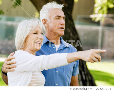 Senior couple relaxing in park 27880795