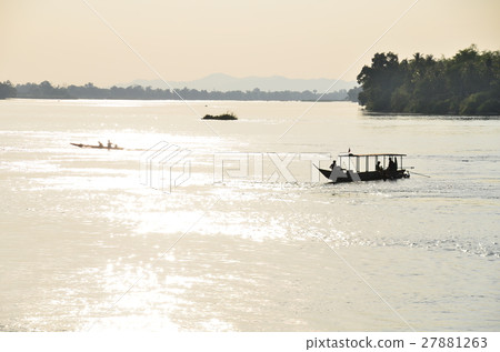 A spectacular view of Sea Pandon Deut Island in Laos Boat riding with the sunset on the Mekong River A spectacular view of Sea Pandon Deut Island in Laos Boat riding with the sunset on the Mekong River 27881263