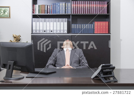 Businessman who is depressed at office Businessman who is depressed at office 27881722