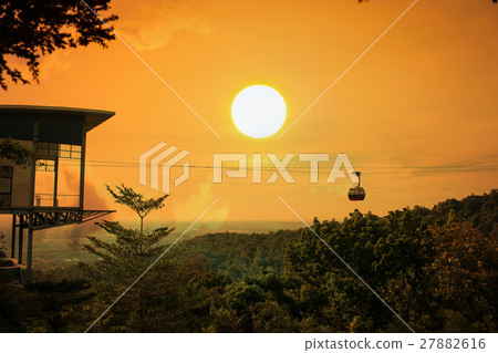 Cable car on the  mountain sunset background 27882616