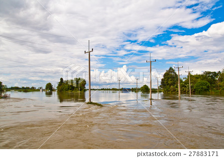 Electricity poles and houses flooded Electricity poles and houses flooded 27883171