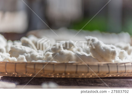 Silkworm cocoon in basket 27883702