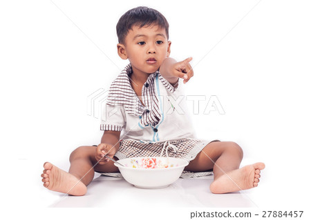 Little boy eatting food Little boy eatting food 27884457