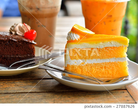 Orange cake and cold drink 27887626